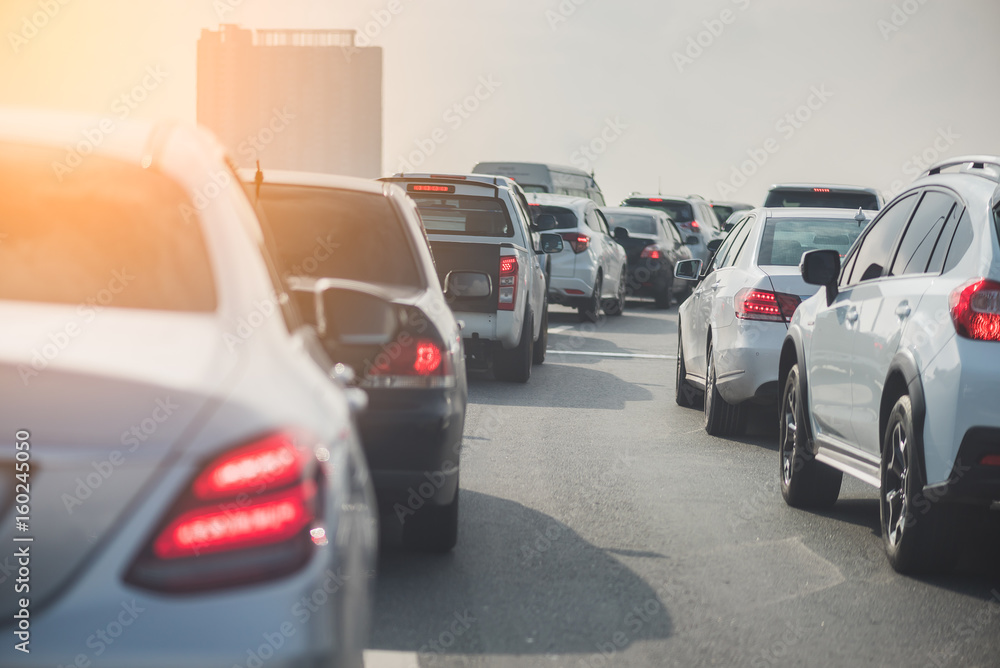 traffic jam on toll way with row of cars