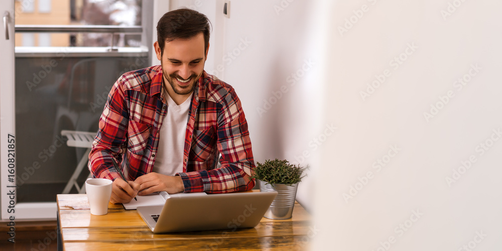 Man using computer at home