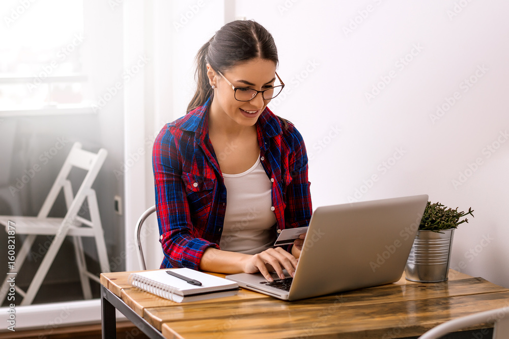 Casual style girl doing some web shopping