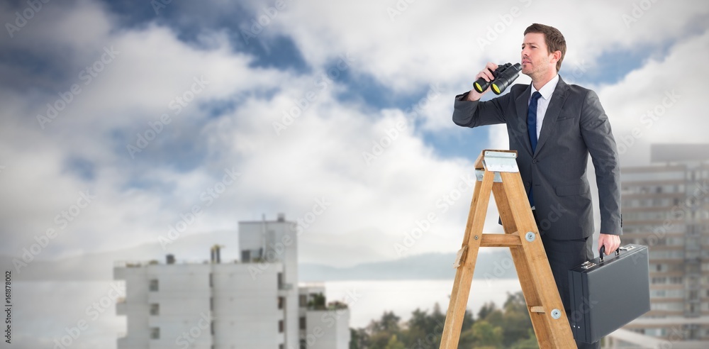 Composite image of businessman looking on a ladder