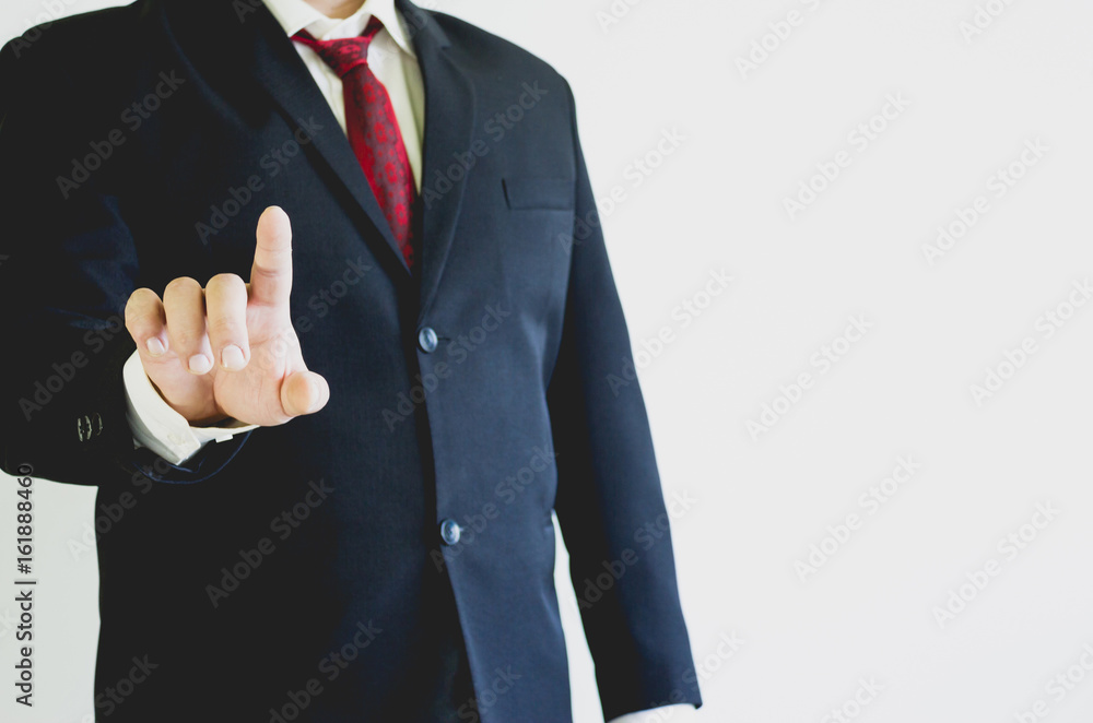 Businessman pointing in the air