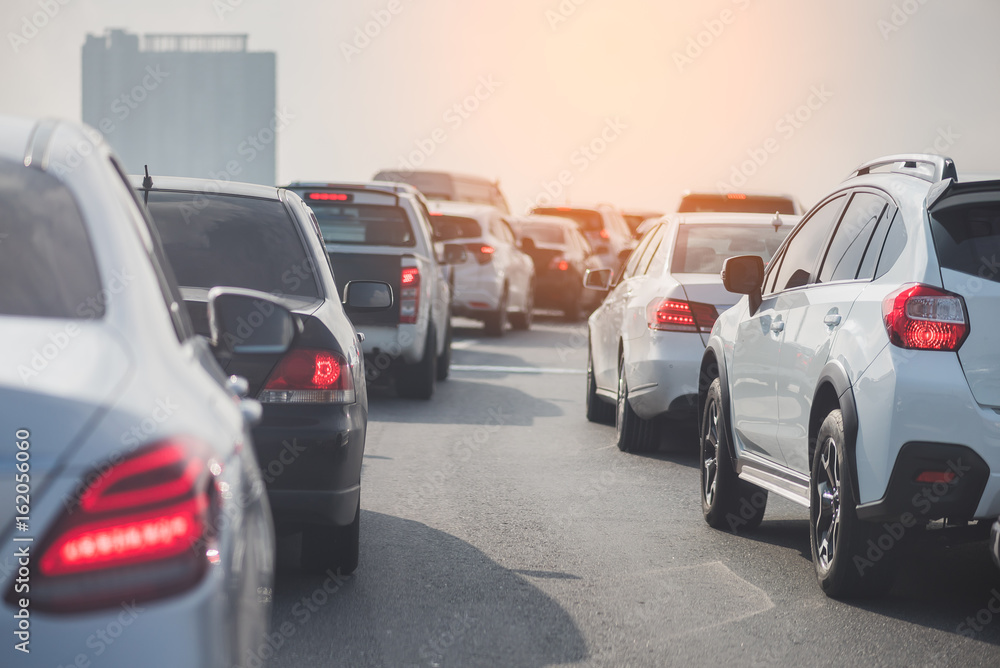 traffic jam on toll way with row of cars