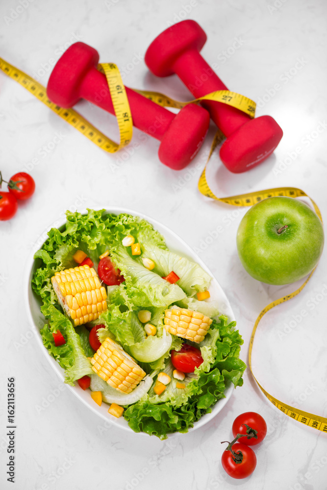 Healthy fitness meal with fresh salad. Diet concept.