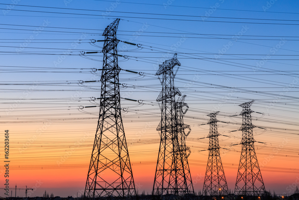 high voltage post,High voltage tower sky sunset background