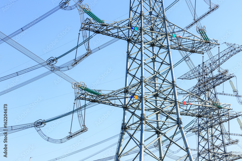 high voltage post,High voltage tower sky background