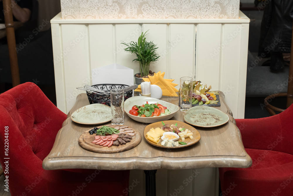 table with food in cafe or restaurant