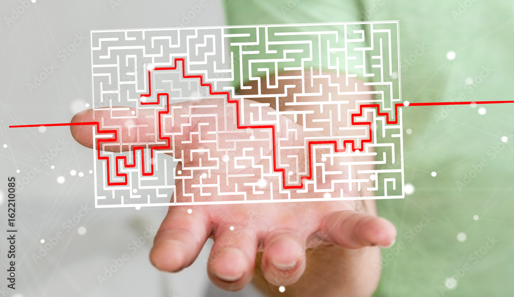 Businessman searching solution of a complicated maze