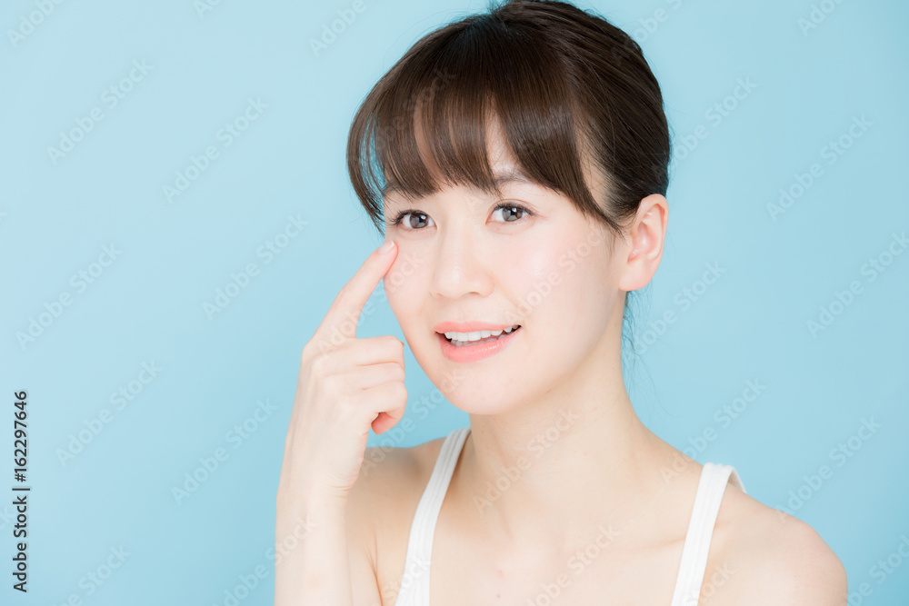 attractive asian woman beauty image on blue background