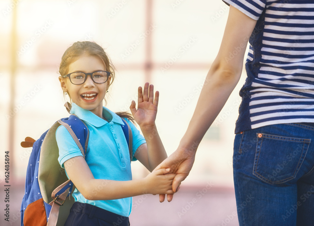 Parent and pupil go to school