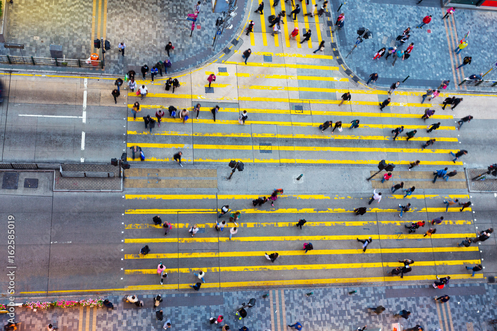 crowde people on road intersection