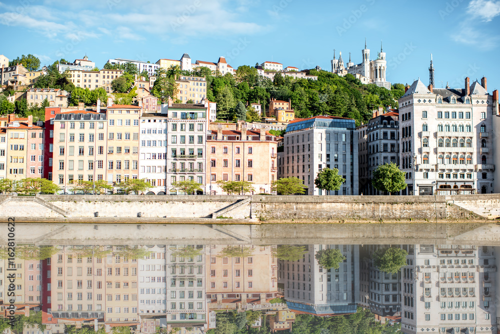 Morning view on the riverside with beautiful buildings in the old town of Lyon city