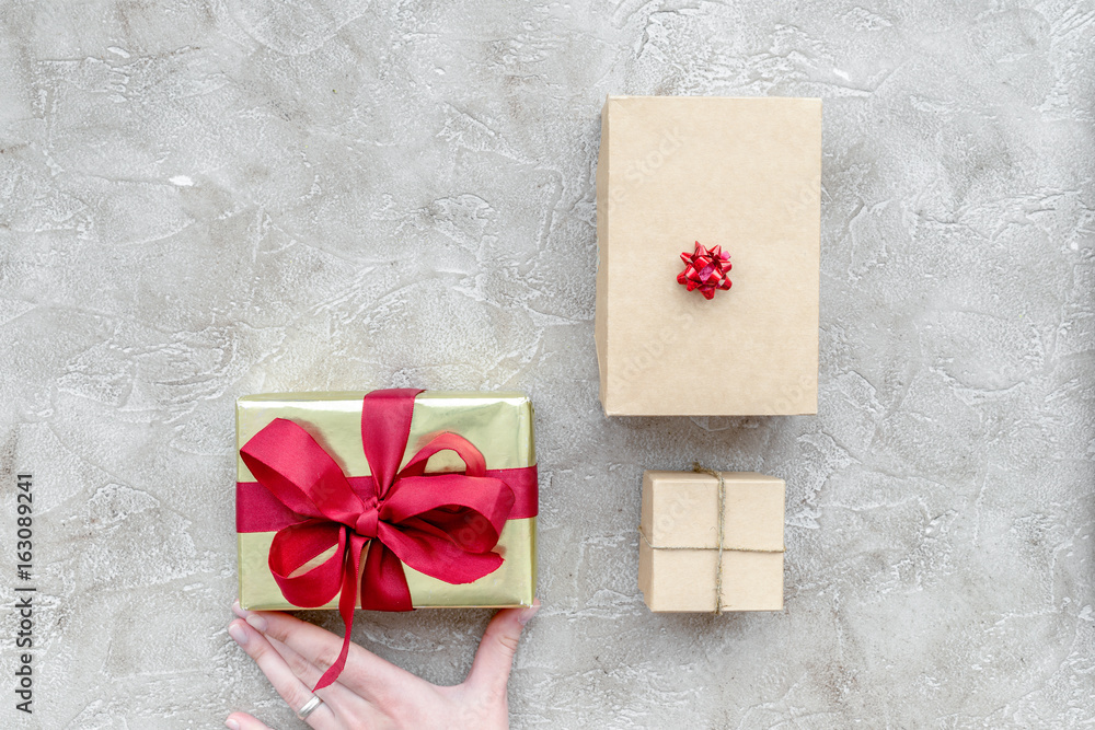 wrapping gifts in box for holiday top view mock up