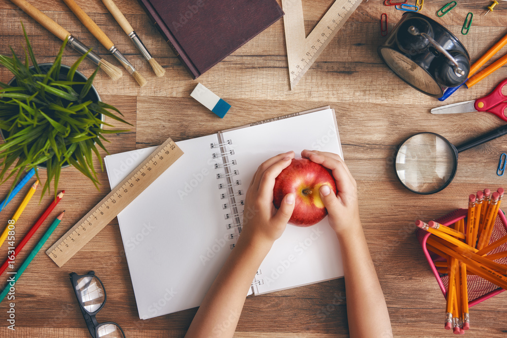 Wooden desk with supplies