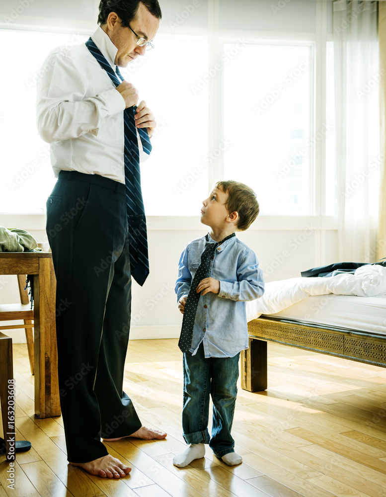 on the Bedroom Son and Dad Put on Clothes Routine Life