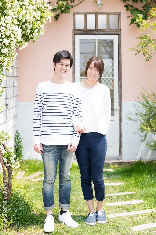 portrait of young asian couple relaxing