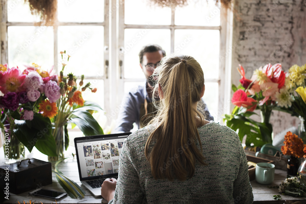 Flower shop business owner working service