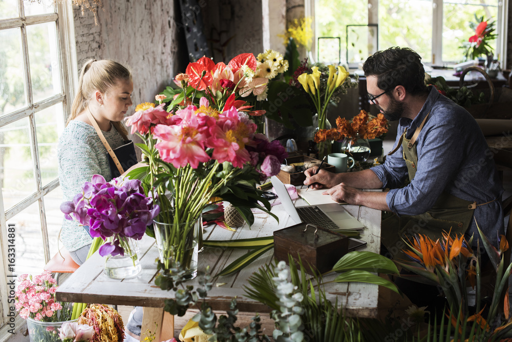 Flower shop business owner working service