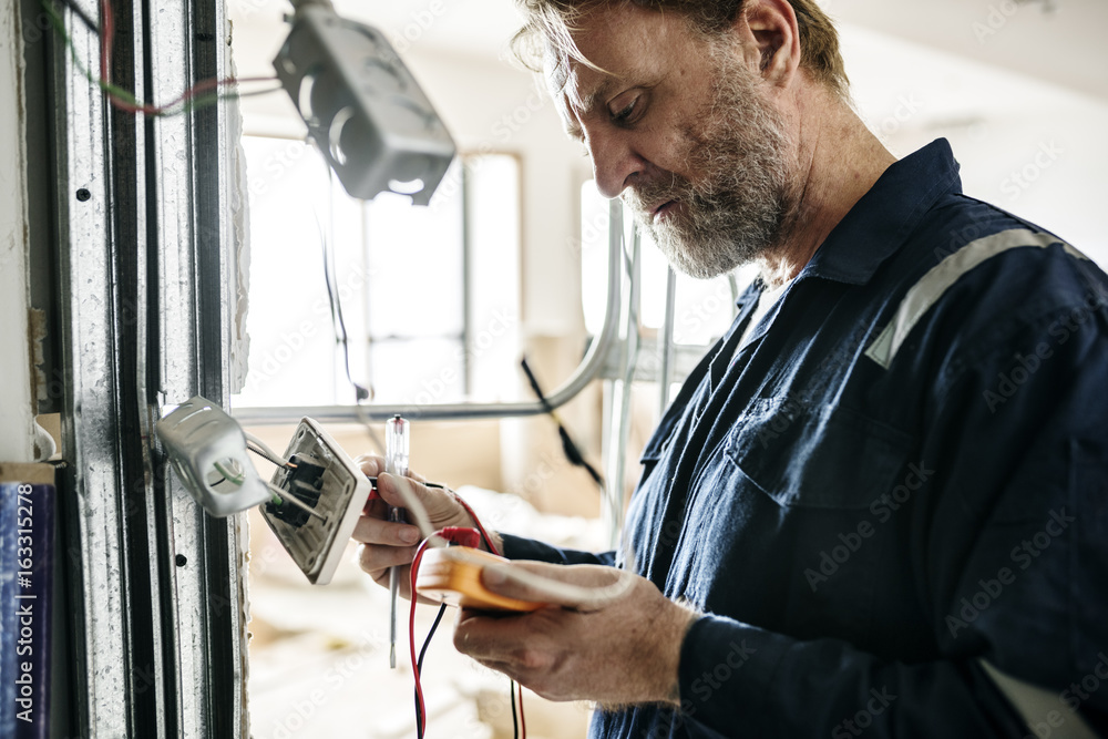 Electrician working house repair installation