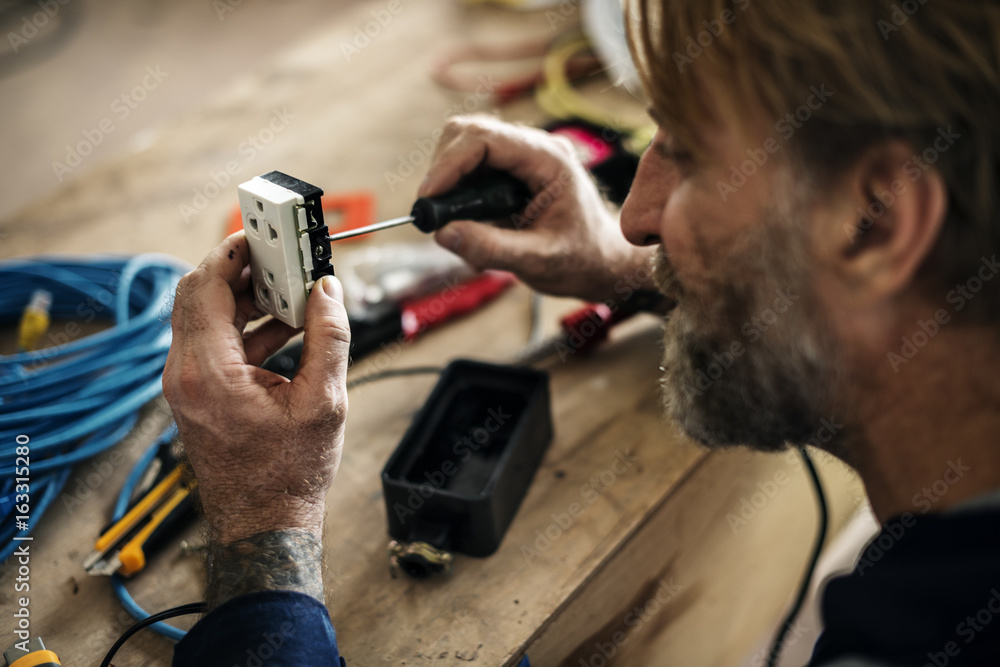 Electrician working house repair installation