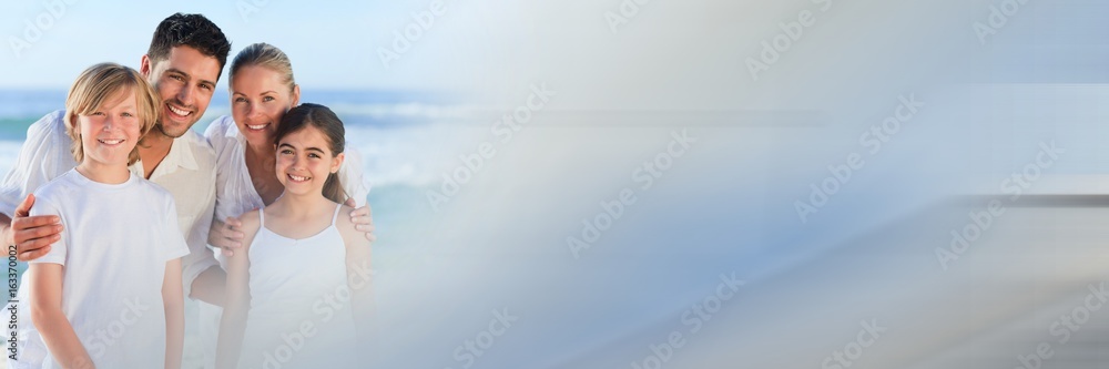 Family at beach with grey and blue transition