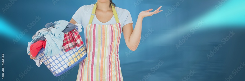 Cleaner  holding laundry basket with bright background