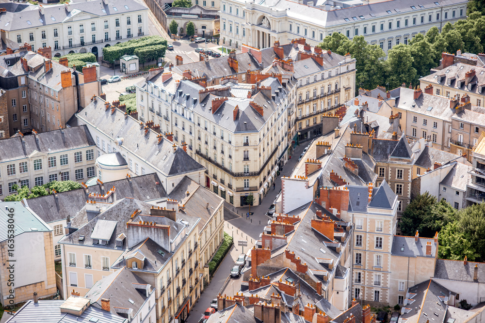 Aerial cityscape view with beautiful buildings in Nantes city during the sunny weather in France