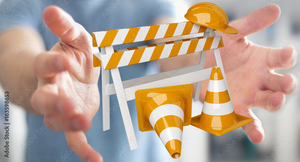 Businessman using digital 3D rendering under construction signs