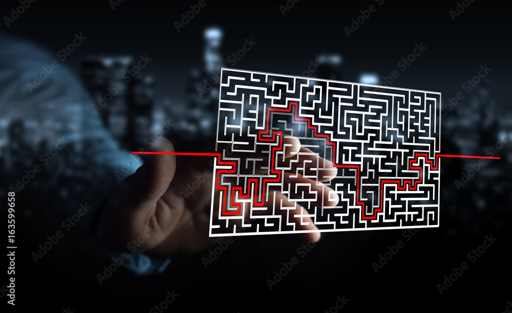 Businessman searching solution of a complicated maze