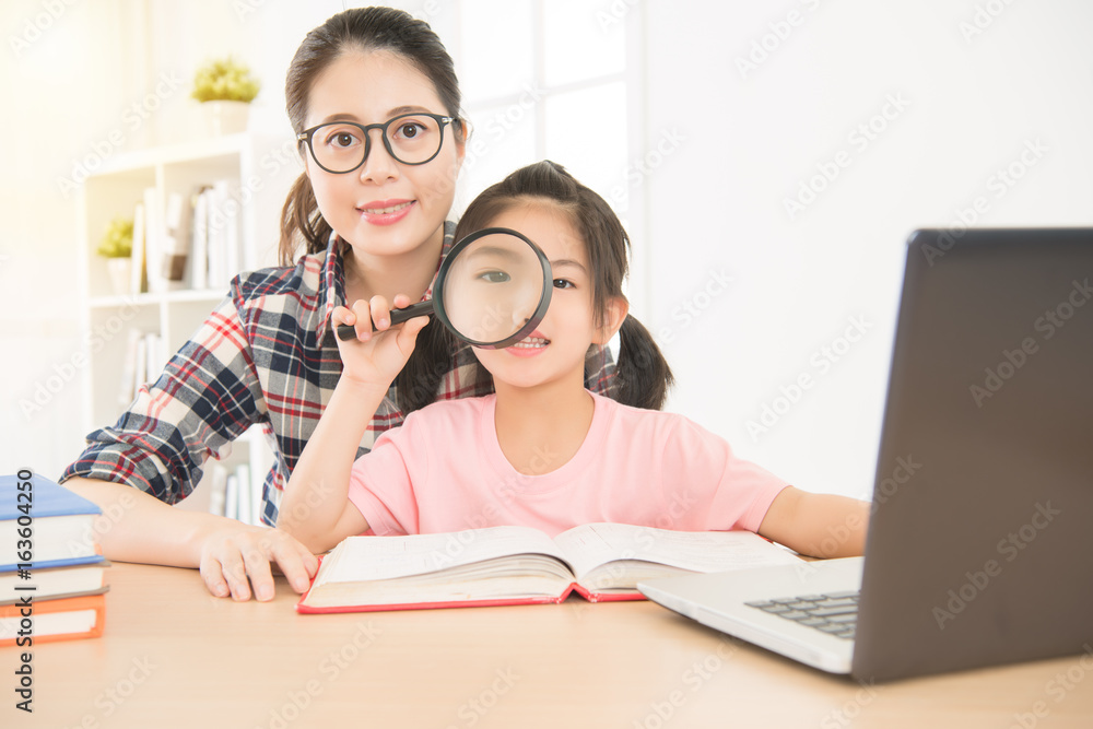 portrait of glasses woman teacher and young girl