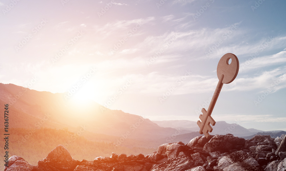 Conceptual background image of concrete key sign and natural landscape