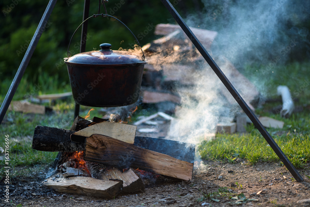 Cooking on a fire in the forest