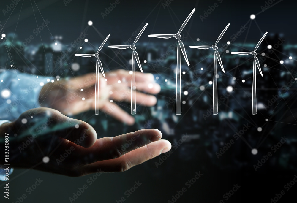 Businessman holding renewable energy sketch