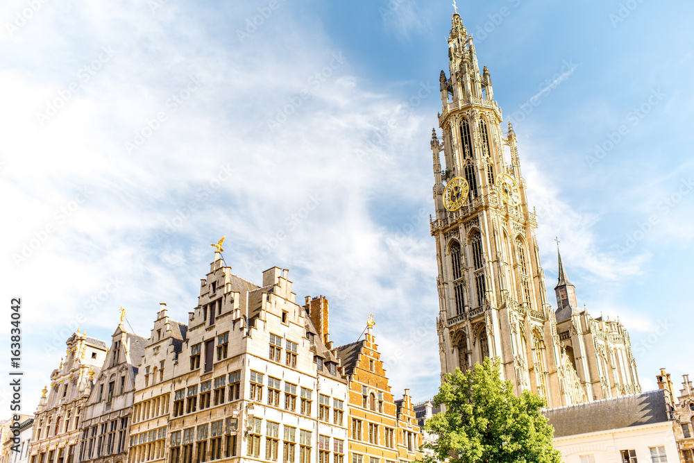 View on the beautiful buildings with the church tower in the center of Antwerpen city in Belgium