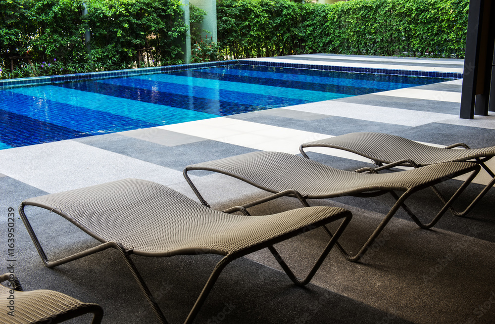 The bed beside the pool.