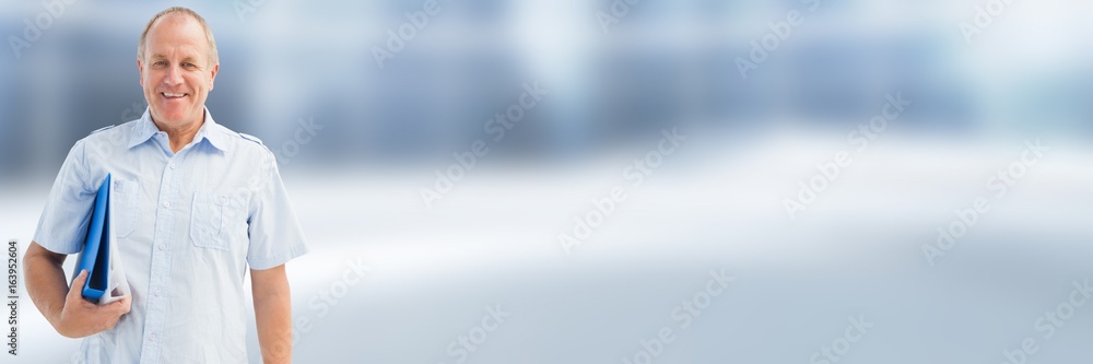 Man holding files and folders with blurred background