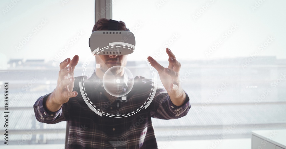 Man in VR headset touching interface