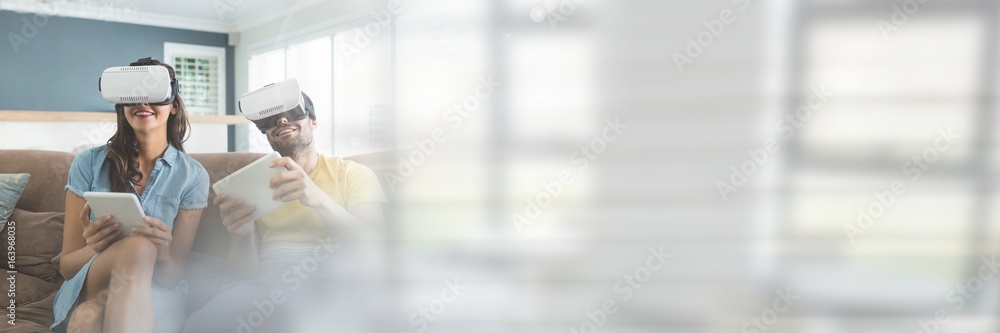 Couple Wearing VR Headset by windows