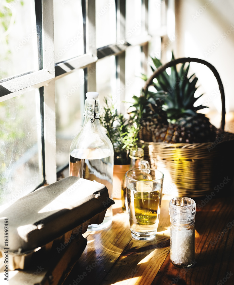 Eggs and cooking oil by the glass window