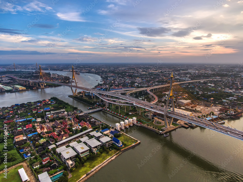 Aerial view Road roundabout with car lots.Bhumibol Bridge in Thailand.street large beautiful downtow