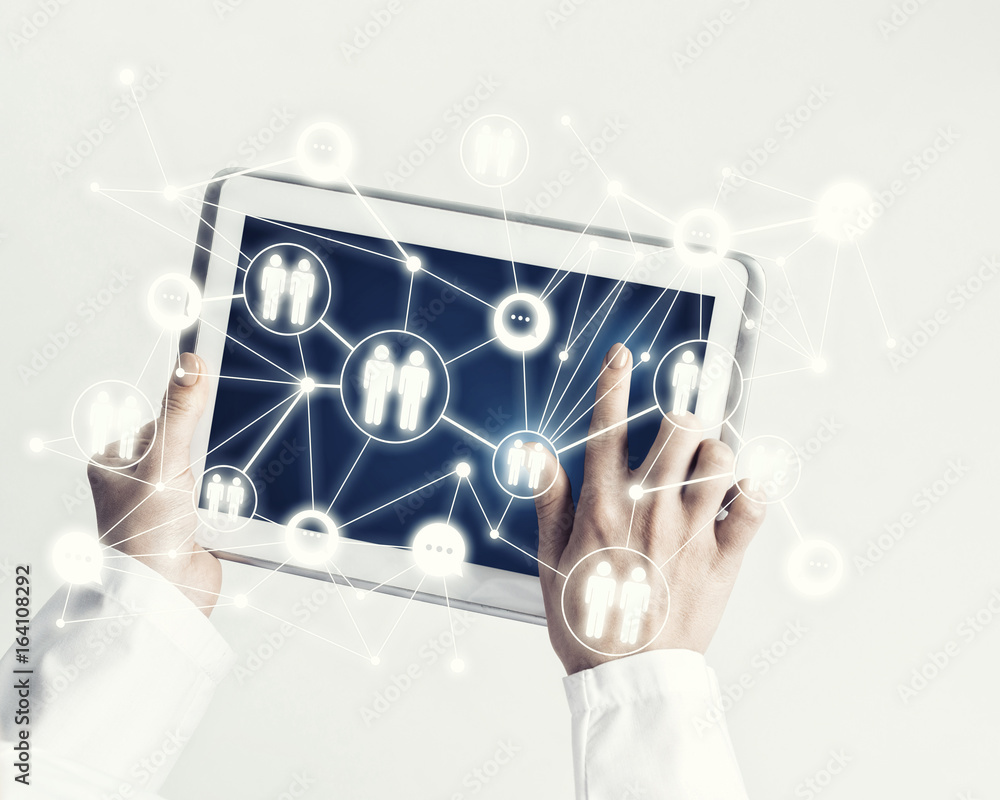 Close of female doctor hands working with tablet pc computer