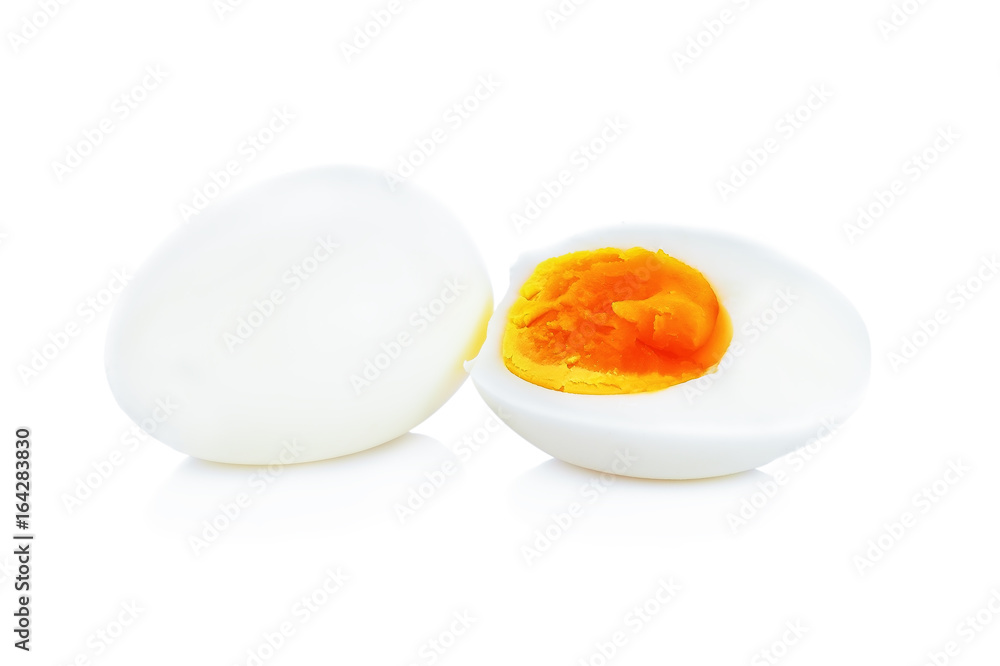 Boiled eggs cut in half isolated on white background.