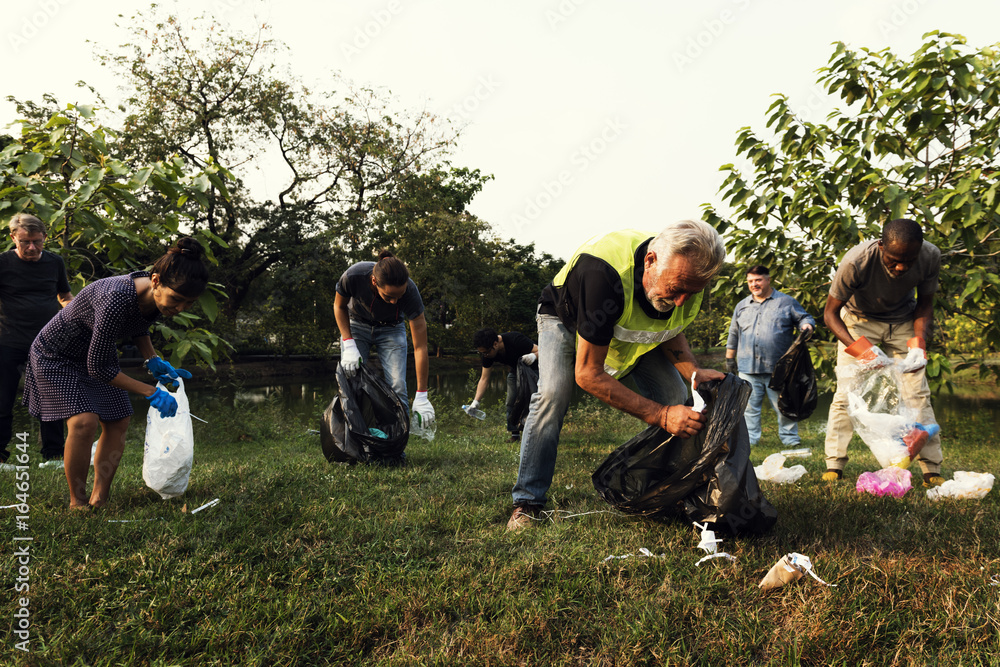 Ecology group of people cleaning the park