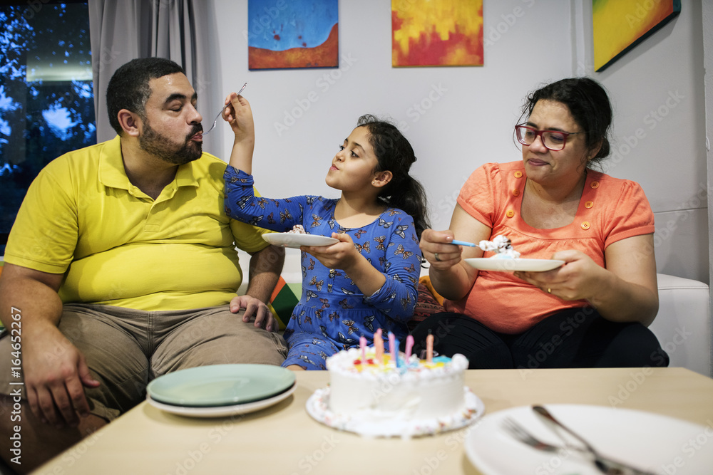 Brazilian family enjoying daughter birthday party