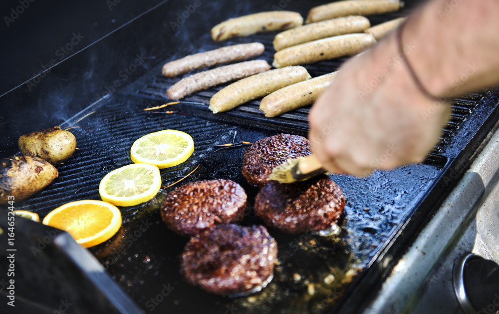 Closeup of cooking burger patties grill