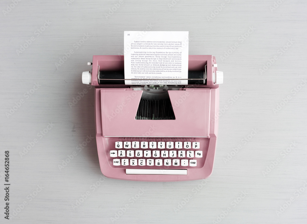 Retro Typewriter Machine on Gray Table