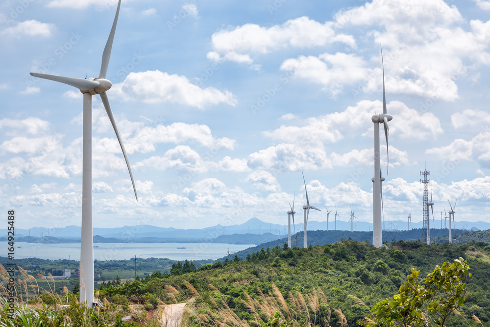 wind farm beside the lake