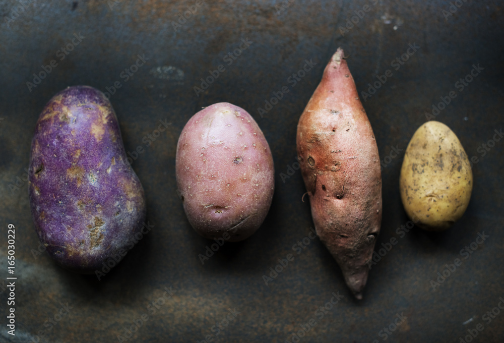 Closeup of fresh various organic potatoes