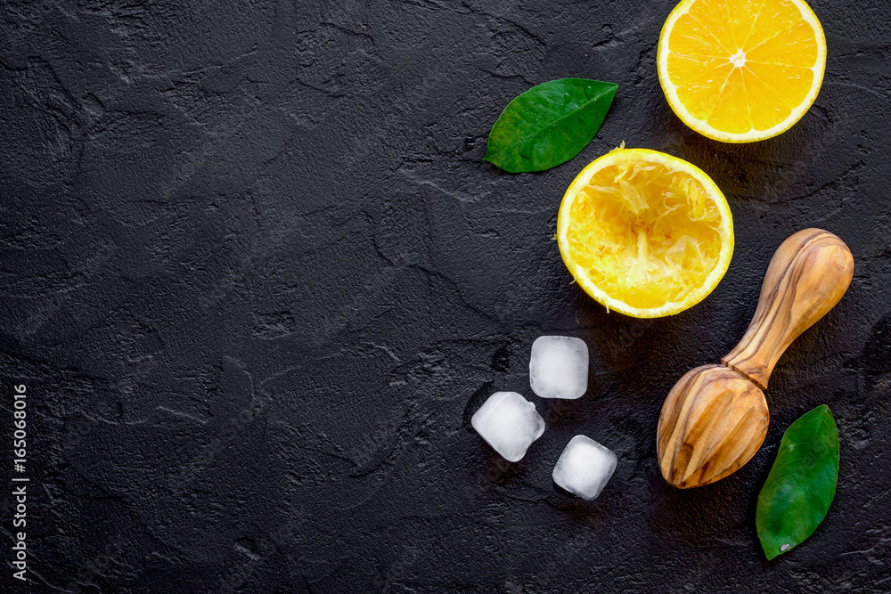 freshly squeezed orange juice on dark background top