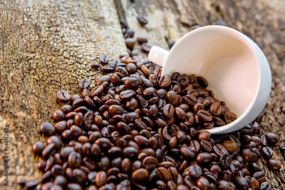 Coffee. Coffee beans. Coffee cup full of coffee beans.