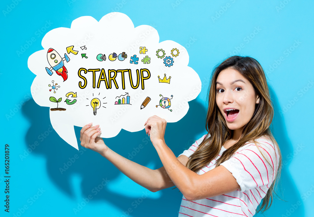 Start Up text with young woman holding a speech bubble on a blue background